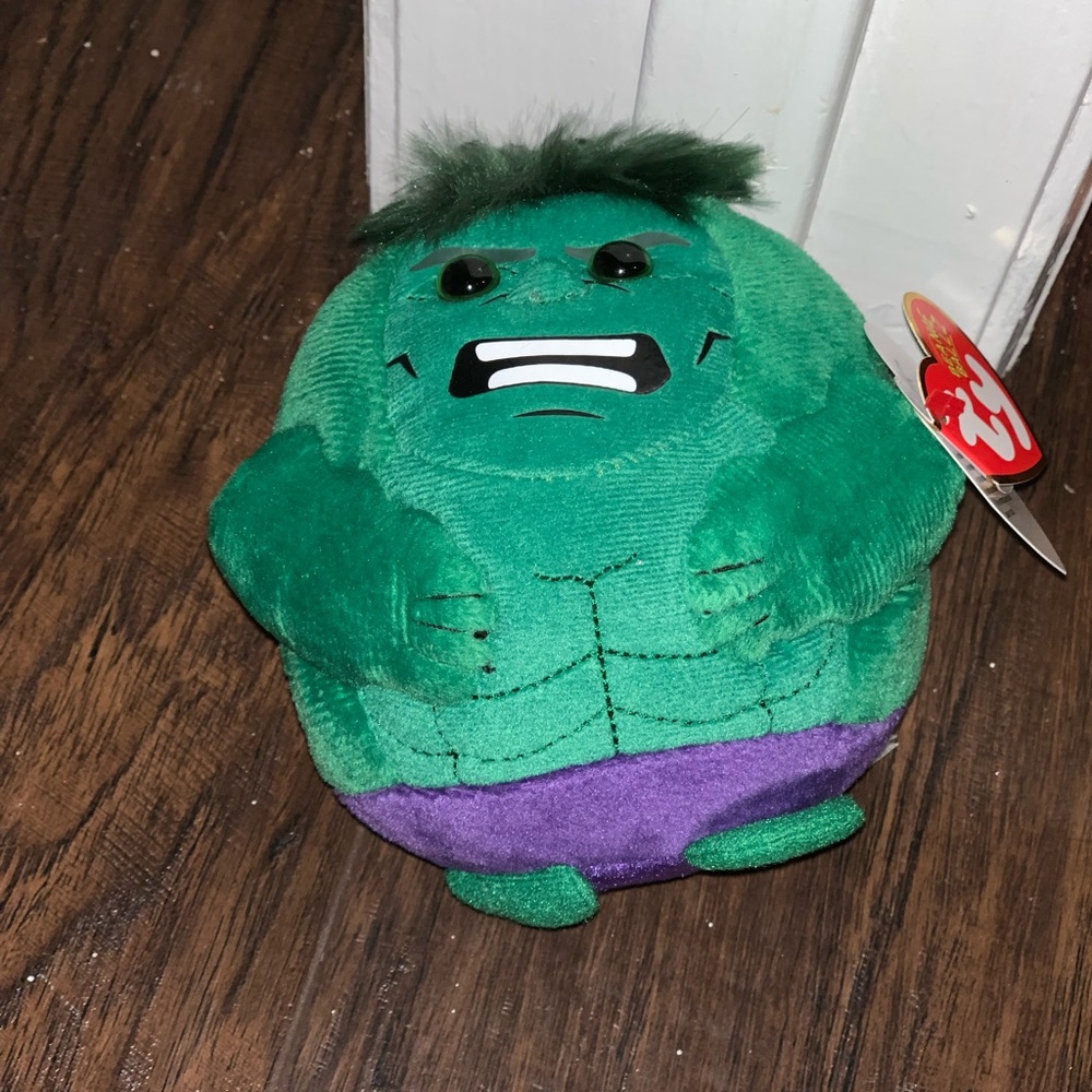 Angry green stuffed animal